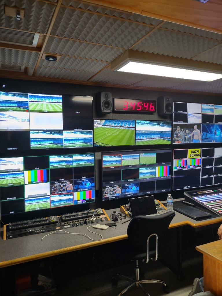 Full broadcast monitor wall showing live cameras during DAZN Boxing production