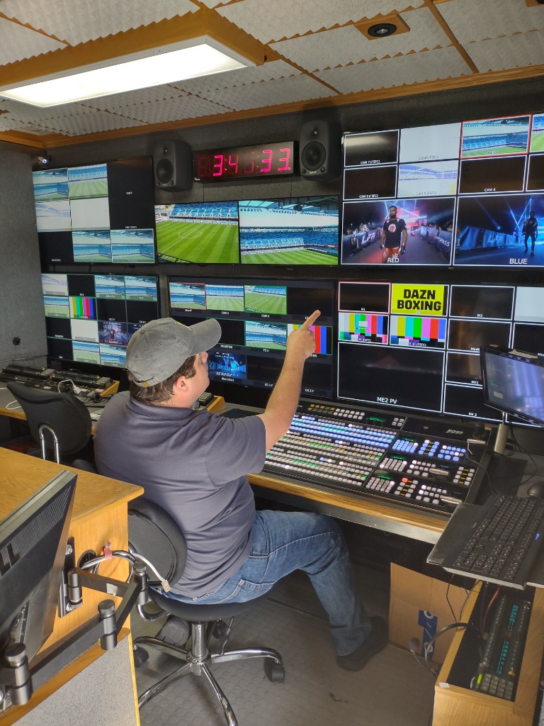 Pay Per Stream broadcast engineer operating live switcher for DAZN Boxing